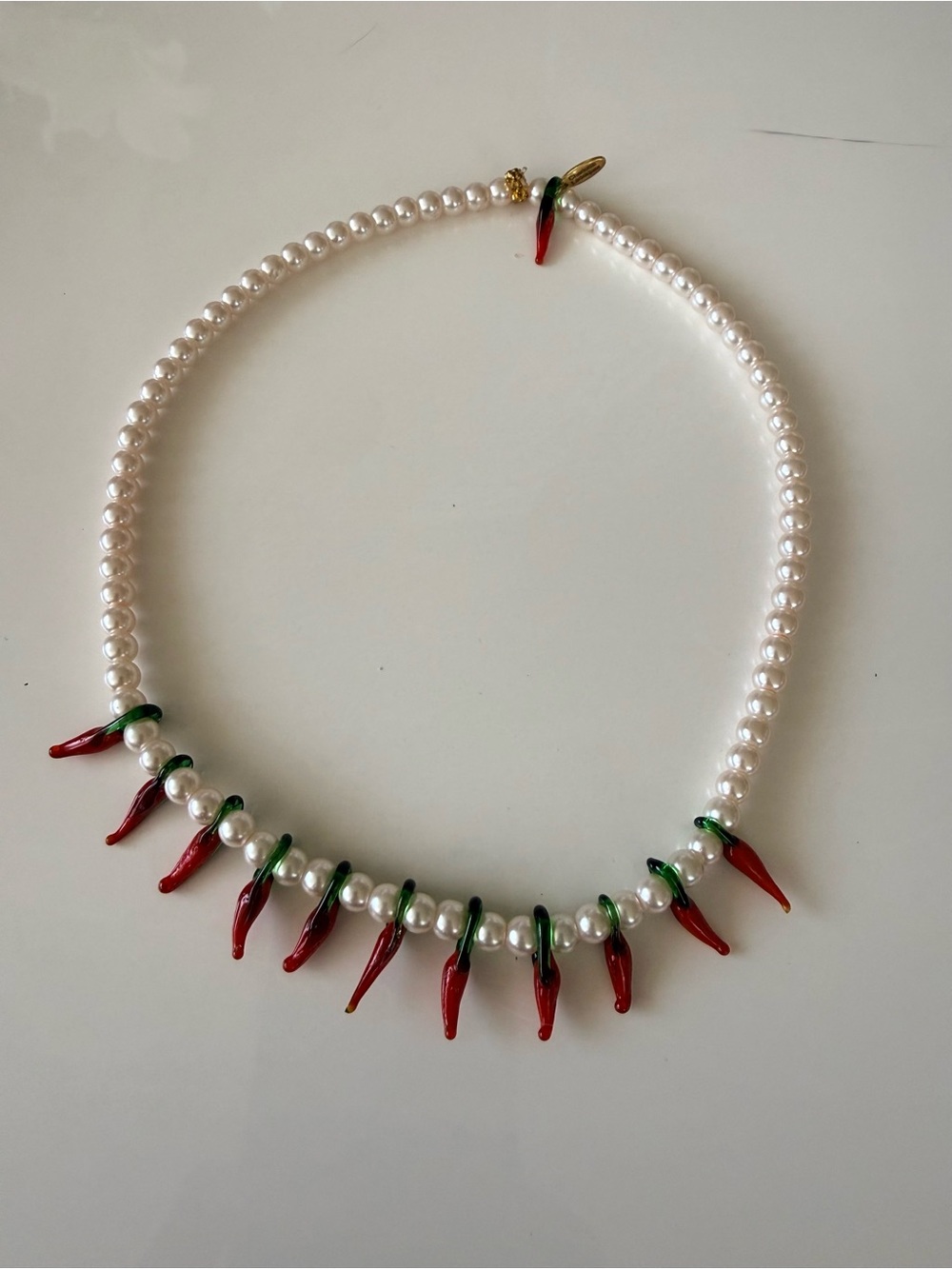 Short white pearl necklace with red hot chilly 🌶️